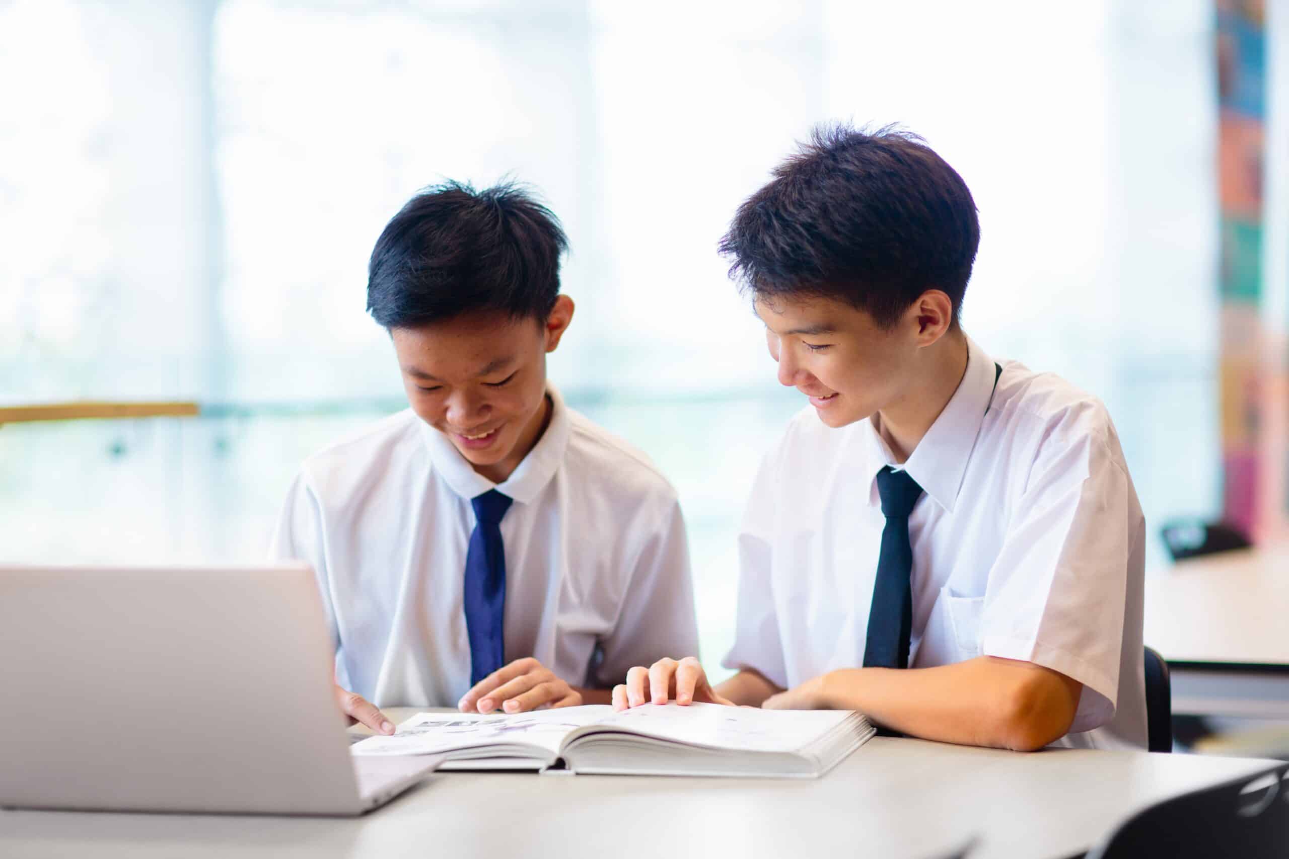 Two-Secondary-School-Boys-Learning-English-Augustine-English-Classes-scaled.jpg